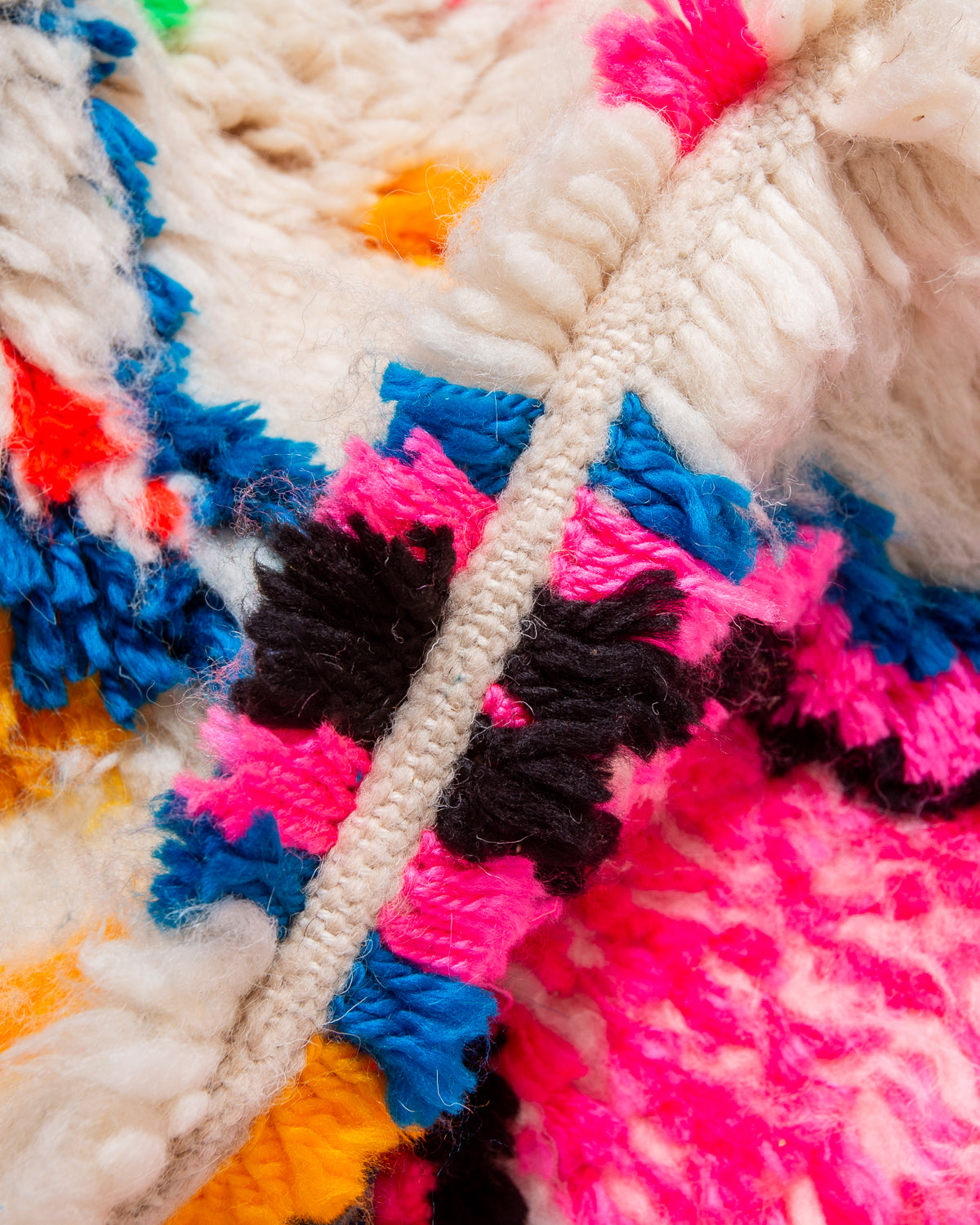 Modern designer handcrafted Berber rug from Morocco. Azilal rug with beautiful colours and patterns. Made of sheep’s wool and colourful cotton.
